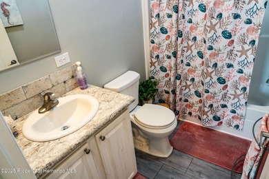 PRICE IMPROVEMENT !!! WELCOME HOME to this exquisite Waterfront