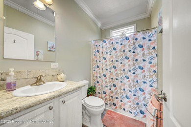 PRICE IMPROVEMENT !!! WELCOME HOME to this exquisite Waterfront