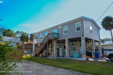 PRICE IMPROVEMENT !!! WELCOME HOME to this exquisite Waterfront