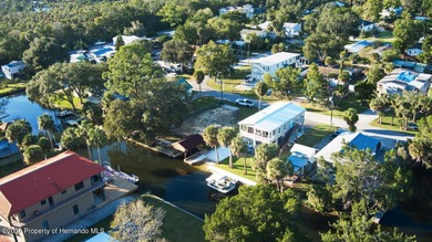 PRICE IMPROVEMENT !!! WELCOME HOME to this exquisite Waterfront