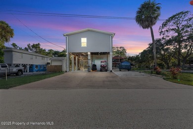 PRICE IMPROVEMENT !!! WELCOME HOME to this exquisite Waterfront