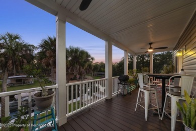 PRICE IMPROVEMENT !!! WELCOME HOME to this exquisite Waterfront