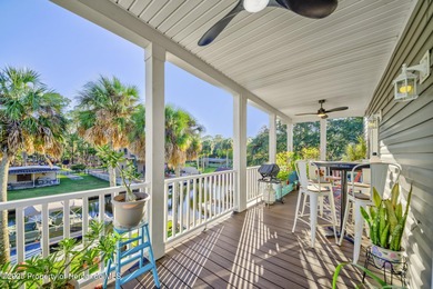 PRICE IMPROVEMENT !!! WELCOME HOME to this exquisite Waterfront