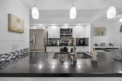 Beautifully updated 2/2 condo located in the desirable 55+