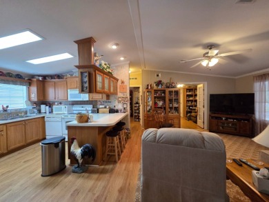 This 2 bed 2 bath home with an office is located in Bay's End