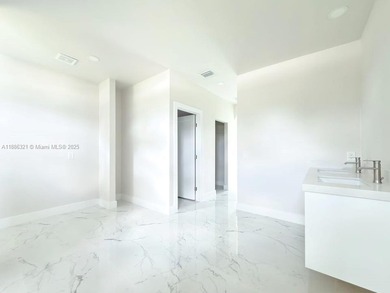 Welcome to your dream home in Lehigh Acres! This elegant