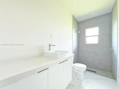 Welcome to your dream home in Lehigh Acres! This elegant