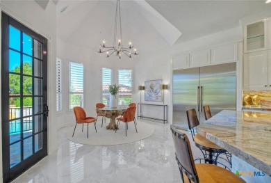 Set on a rare double lot overlooking the scenic Avery Ranch Golf