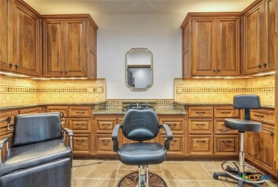 Set on a rare double lot overlooking the scenic Avery Ranch Golf