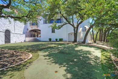 Set on a rare double lot overlooking the scenic Avery Ranch Golf
