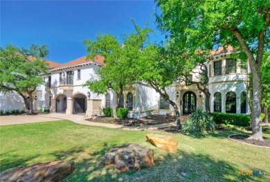 Set on a rare double lot overlooking the scenic Avery Ranch Golf