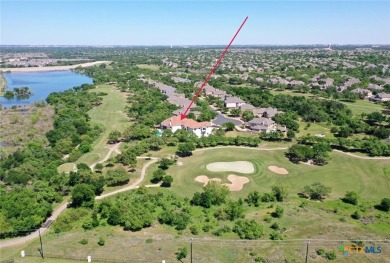Set on a rare double lot overlooking the scenic Avery Ranch Golf