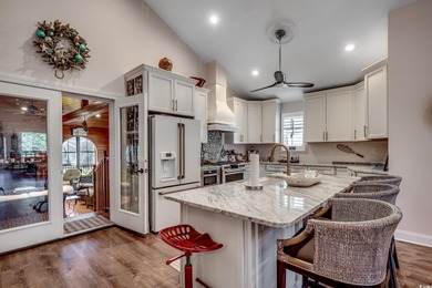 Experience the essence of coastal living in this elegant home