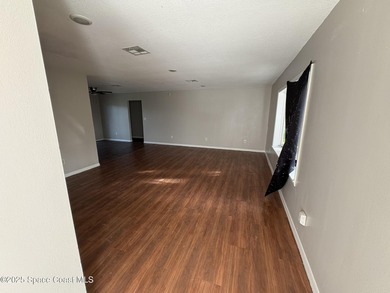 A beautifully maintained 4-bedroom, 2-bath, 1,875 sq. ft. home