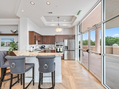 Rising high above Estero Bay, this 7th floor sky home at Bayview