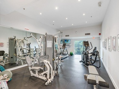 Rising high above Estero Bay, this 7th floor sky home at Bayview