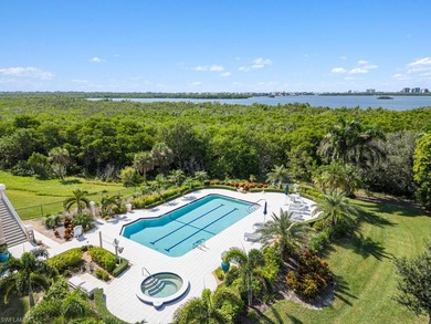 Rising high above Estero Bay, this 7th floor sky home at Bayview