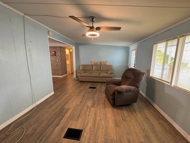 Welcome to this lovely 3-bedroom/2-bath manufactured home, just