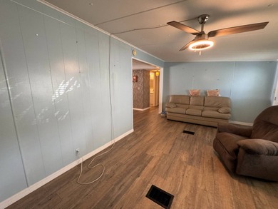 Welcome to this lovely 3-bedroom/2-bath manufactured home, just