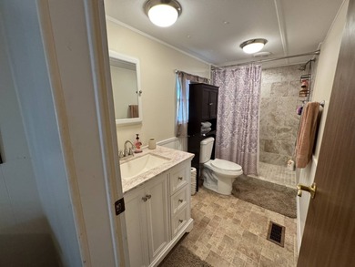 Welcome to this lovely 3-bedroom/2-bath manufactured home, just