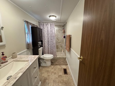 Welcome to this lovely 3-bedroom/2-bath manufactured home, just