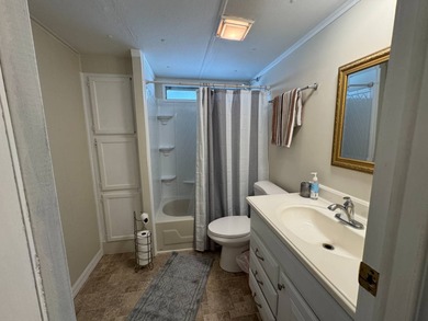 Welcome to this lovely 3-bedroom/2-bath manufactured home, just
