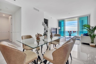 Experience breathtaking oceanfront living in this elegant