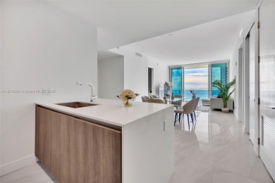 Experience breathtaking oceanfront living in this elegant