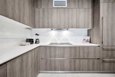 Experience breathtaking oceanfront living in this elegant