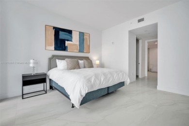 Experience breathtaking oceanfront living in this elegant