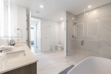 Experience breathtaking oceanfront living in this elegant