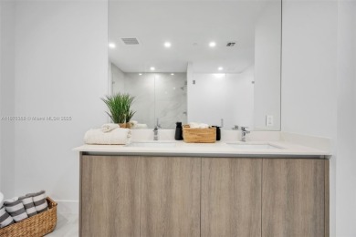 Experience breathtaking oceanfront living in this elegant