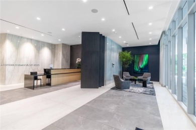 Experience breathtaking oceanfront living in this elegant