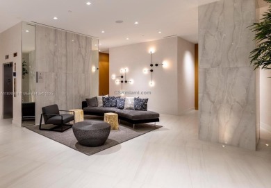 Experience breathtaking oceanfront living in this elegant