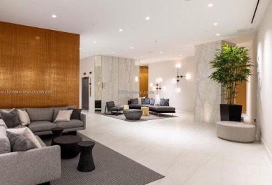 Experience breathtaking oceanfront living in this elegant