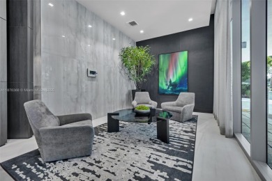 Experience breathtaking oceanfront living in this elegant