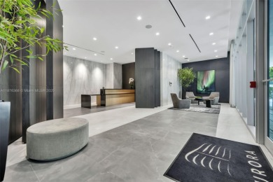 Experience breathtaking oceanfront living in this elegant