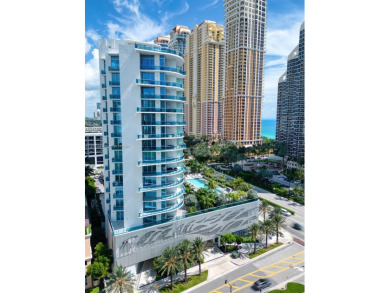 Experience breathtaking oceanfront living in this elegant