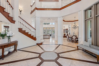 One of a Kind custom estate home on a point lot with turning