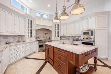 One of a Kind custom estate home on a point lot with turning