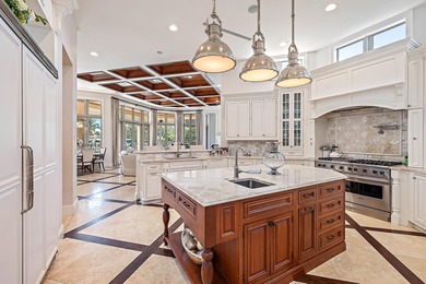 One of a Kind custom estate home on a point lot with turning