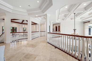 One of a Kind custom estate home on a point lot with turning