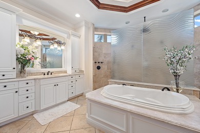 One of a Kind custom estate home on a point lot with turning