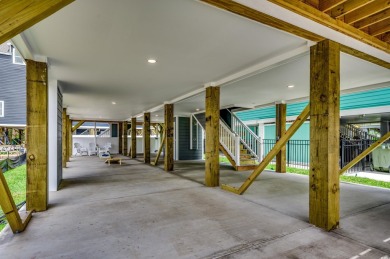 114B 8th Ave S, Surfside Beach, is a single-family raised beach