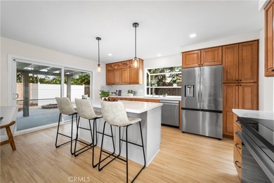 Welcome to a beautifully re-imagined single-level home on a