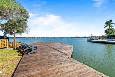 A rare point-lot estate on Key Allegro, blending resort-caliber