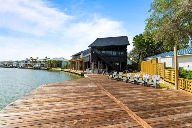 A rare point-lot estate on Key Allegro, blending resort-caliber