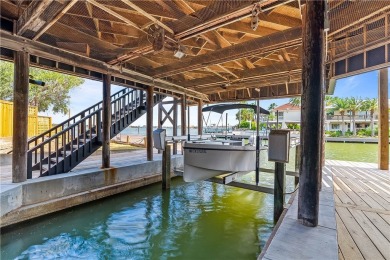 A rare point-lot estate on Key Allegro, blending resort-caliber