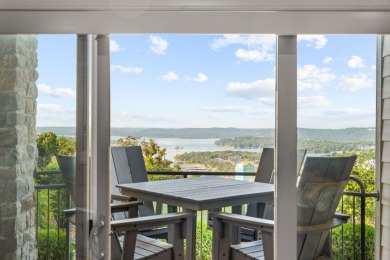 Step into low-maintenance living where the lake is your backdrop