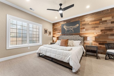 Step into low-maintenance living where the lake is your backdrop